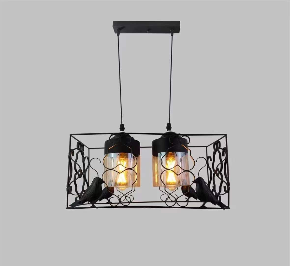 Pendant light with bird